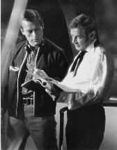 Ray Didsbury consults with Richard Basehart on Script.