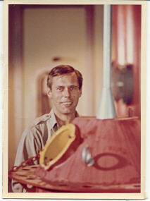 A smiling Ray Didsbury seen with familiar Voyage prop. Is it a failsafe buoy or is it a bomb? Depends on the episode.