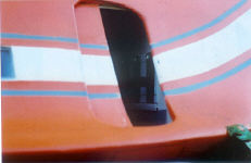 Main access door opens.