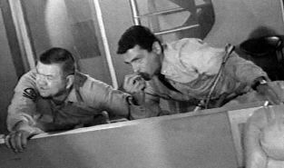 Henry Kulky (Chief Jones) and David Hedison (Captain Crane) in action.