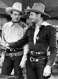 John Wayne and Ray (Crash) Corrigan in Republic's Santa Fe Stampede.