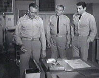 mutiny_doc_tosses_pills.jpg - 9270 Bytes