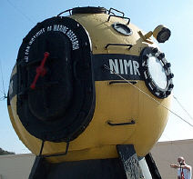 Diving Bell on Aqua-Tech roof with dave in background.